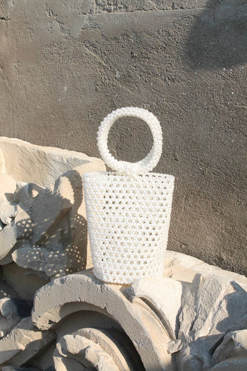 Styled outfit with round ring tote bag